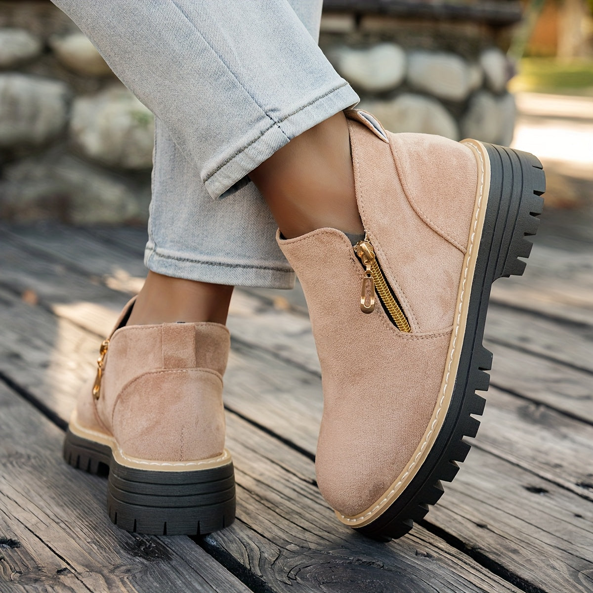 Beige ELARA ankle boots worn, rear and side view