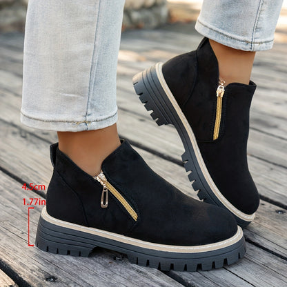 Black ELARA ankle boots showing the supplier's heel-height annotation