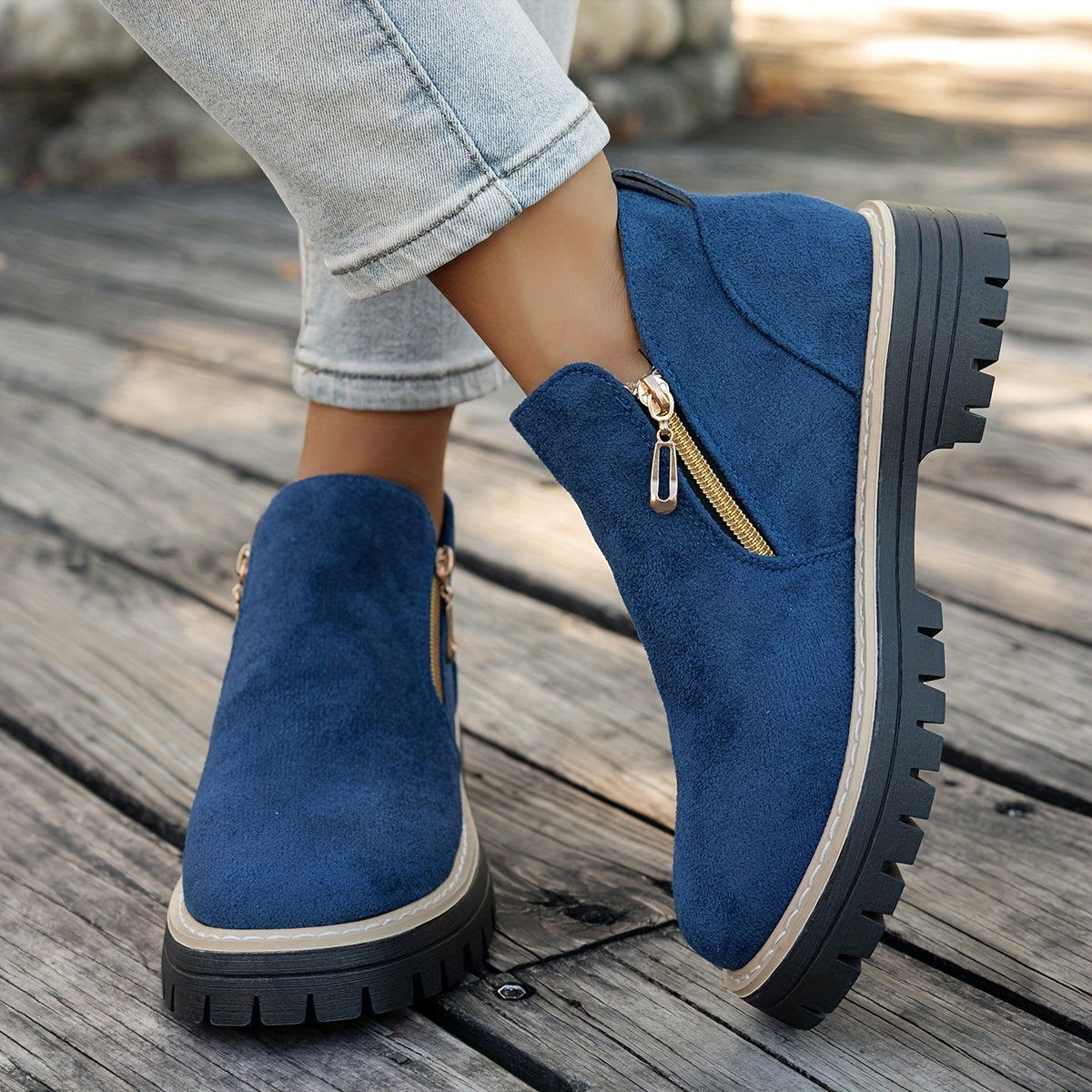 Blue ELARA ankle boots worn with jeans