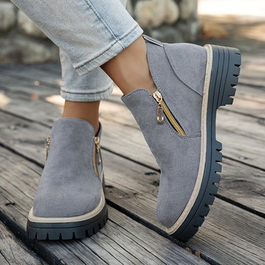 Grey ELARA ankle boots worn with cropped jeans