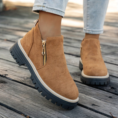Tan ELARA ankle boots worn, front view